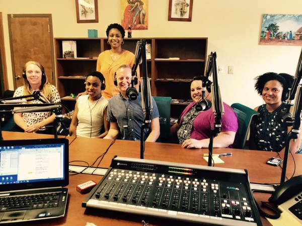 Guests, (Seated, L-R), Laura Colbert, Executive Director, Georgians for a Healthy Future, Berneta Haynes, Director of Equity & Access for Georgia Watch, Bill Rencher, JD, MPH, Research Associate II, Health Policy Center, Georgia State University, Amanda Ptashkin, JD, Project Manager, Community Catalyst, Laura Harker, Policy Analyst, Georgia Budget & Policy Institute, join (Standing, Second Row) Clarkston Speaks Host, Shawanna Qawiy, in the studio to discuss “Health Care Polices & Awareness.” 